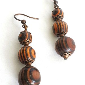 Wooden bead drop earrings with three stacked beads and bronze accents from Stella’s Earrings in Moreletapark Pretoria East South Africa
