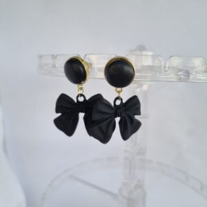 Sleek matte black bow tangle earrings