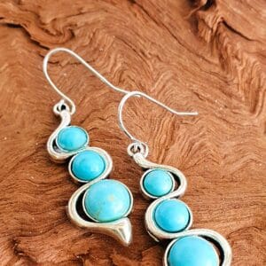 Enchanting Elegance: Antique Silver Turquoise Dangle Earrings