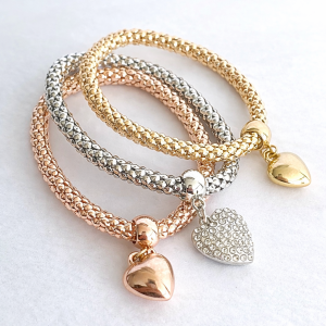 Three-tone heart charm bracelet set with rose gold gold and silver woven bracelets from Stella’s Earrings in Moreletapark Pretoria East South Africa